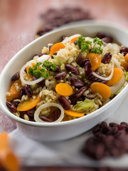 risotto with red beans carrots and onions, selective focus
