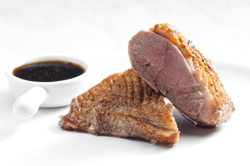 fried duck breast with sauce of honey, balsamico and red wine