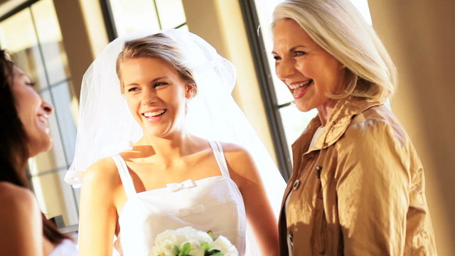 Proud Mother Grandmother Smiling with Bride Wedding Day