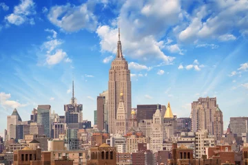 Wall murals Empire State Building NEW YORK CITY - MARCH 12: The Empire State Building shines in th