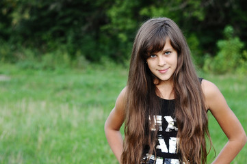 Fototapeta premium Brunette teen girl on nature