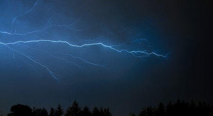 Lightning Flashes Across a Stormy Night Sky