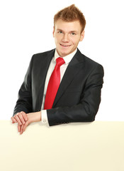 A business man with an empty blank, isolated on white background