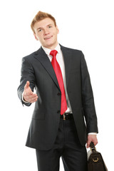 Portrait of a successful businessman giving a hand