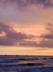 exotic sky over sea at sunset. sunlight with clouds.