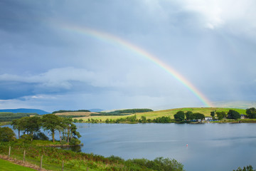 rainbow over a lake