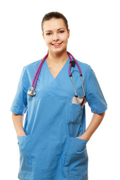 Young nurse standing with her hands in pockets