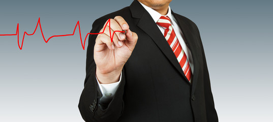 Businessman draw a pulse