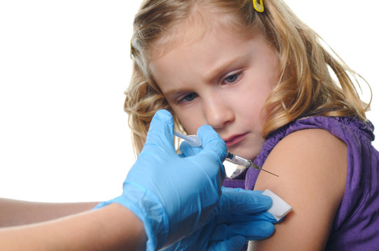 Child Vaccinations On A White