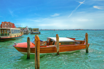 A boat for a tour of the canal in Venice