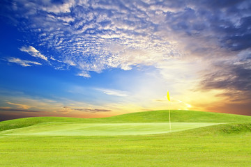 golf course with beautiful sky