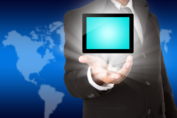business hand holding a tablet touch screen computer