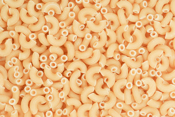 Closeup of uncooked italian pasta background
