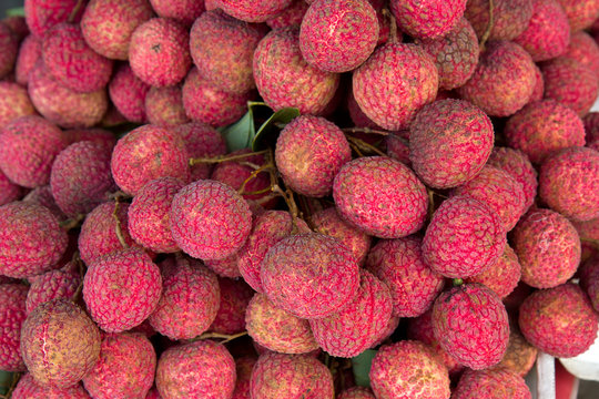 Closeup of freshly produced bunch of ripe and delicious Lychee f