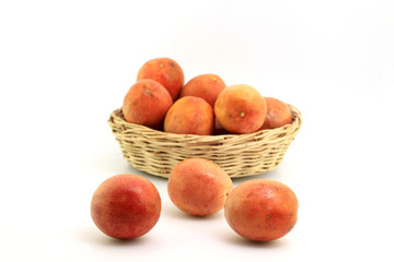 Group of Passion fruit  in wood basket on white background