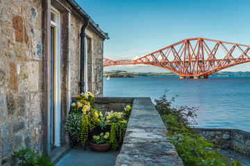House close to the Firth of Forth Bridge in summer
