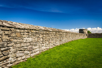 Medieval wall surrounding the castle with stone