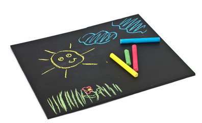 Child's drawings on blackboard  isolated on white