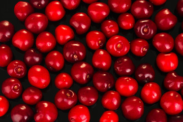cherry background on black close-up