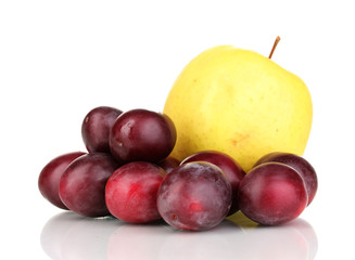 ripe sweet apple and plums isolated on white