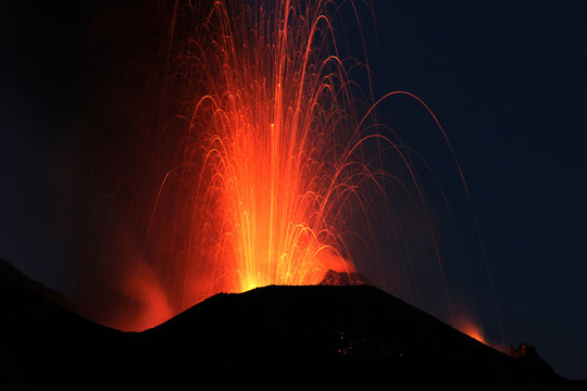 Fire at night. Volcano erupting