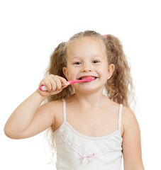 cute child girl brushing teeth isolated on white background