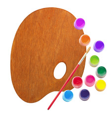 wooden palette with color paints and brush isolated on white bac