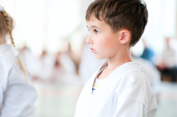 Karate children training in sport hall