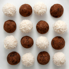 Dark chocolate truffles and white truffles,  are staggered.