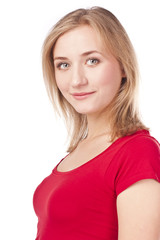 Young woman in the studio. Blonde in red