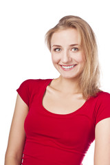 Attractive smiling blond in studio on white
