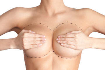 Boobs correction. Plastic surgery, isolated, white background