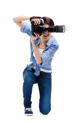 Girl-photographer takes photos, isolated on white