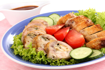 Tasty meat cutlet with garnish on plate