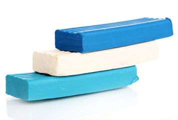 Children bright plasticine isolated on white