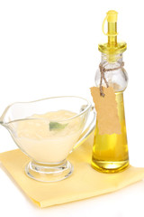 Mayonnaise in bowl on napkin isolated on white