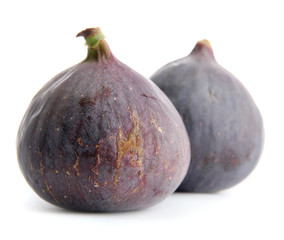 Ripe sweet figs isolated on white