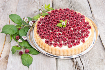 Raspberry Tart against wood