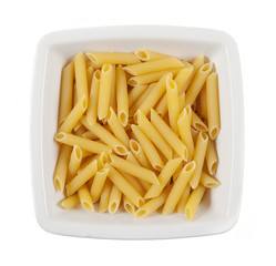 Raw pasta in a dish