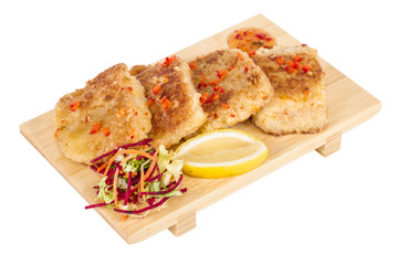 Fried fish fillets with  salad.
