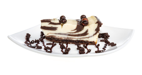 cheesecake with chocolate sauce.