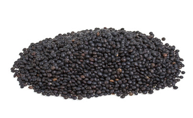 Heap of black lentil isolated on white