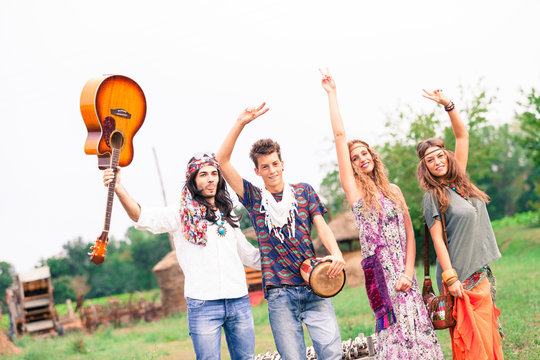 Hippi Group Dancing in the Countryside