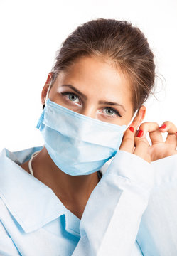 Closeup Portrait Of A Young Doctor Wearing A Mask