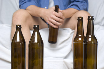 Man with beer bottles
