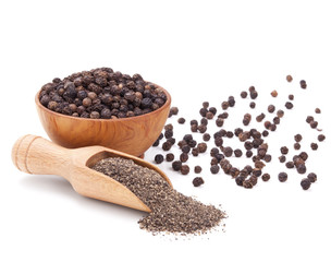 milled black pepper isolated on white