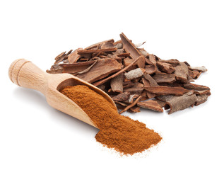 milled cinnamon isolated on white © andriigorulko