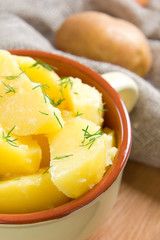 Boiled potatoes with dill and butter
