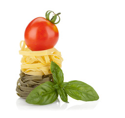Fettuccine nest pasta with tomato cherry and basil