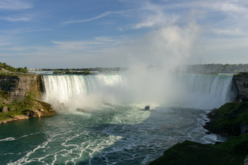 ship trying to push water foamed of niagara fall